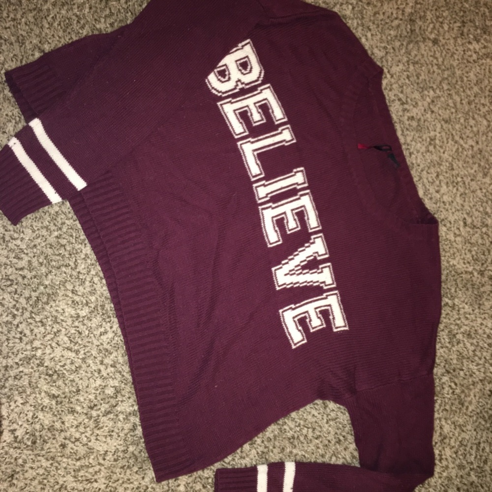 “Believe” sweater